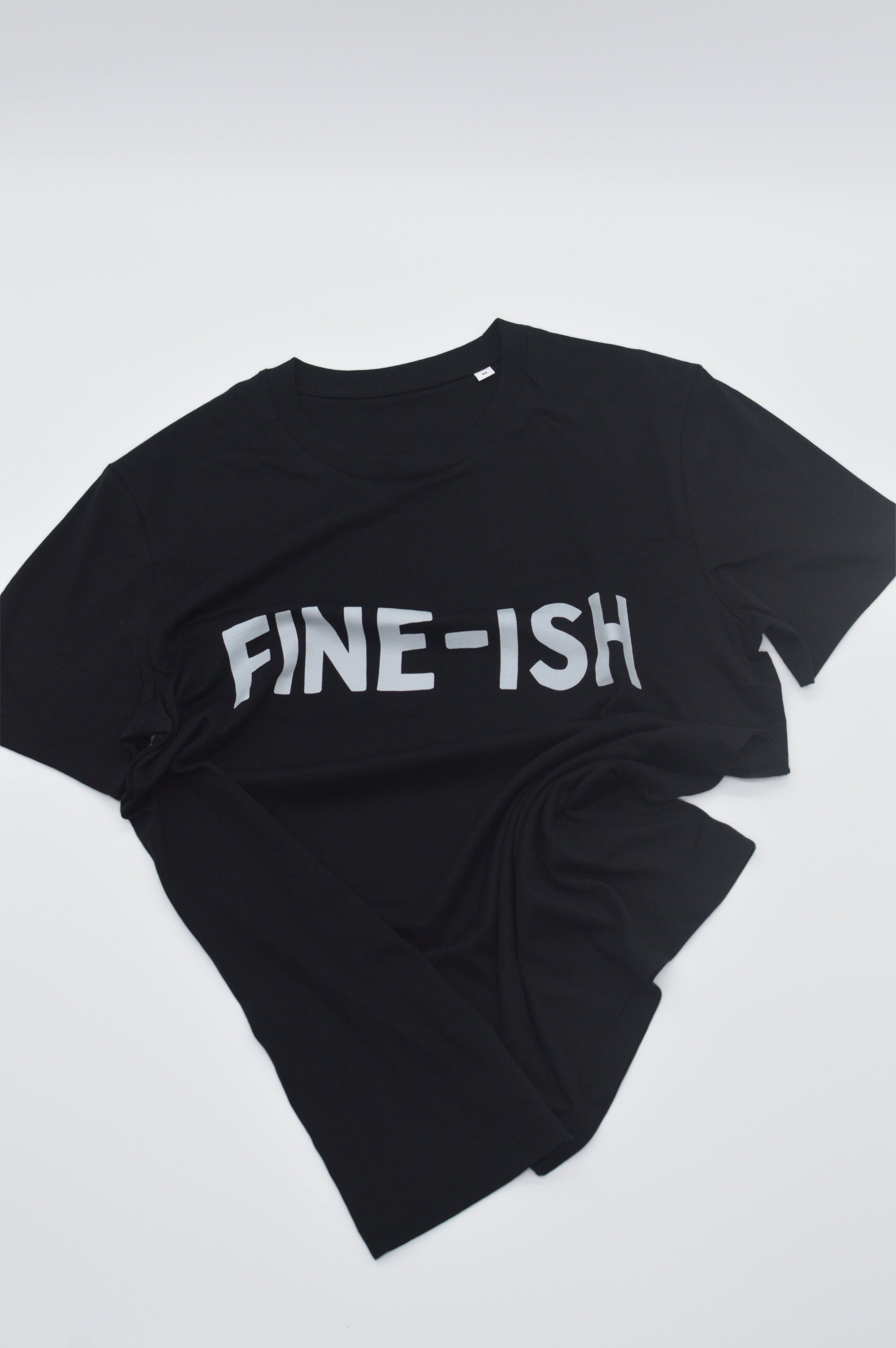 Black  shirt with 'FINE-ISH' text on a white background