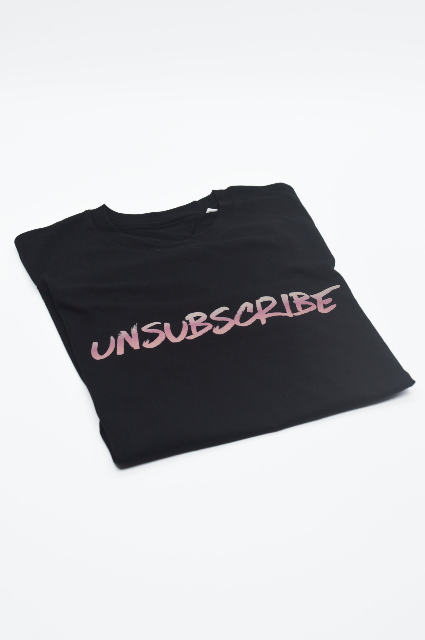 Black t-shirt with 'UNSUBSCRIBE' text on a white background