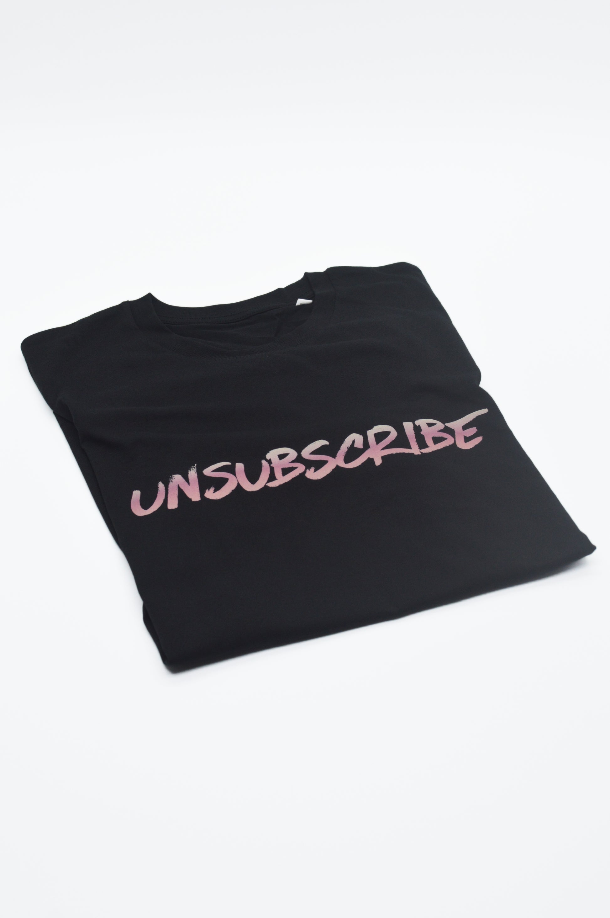 Black t-shirt with 'UNSUBSCRIBE' text on a white background
